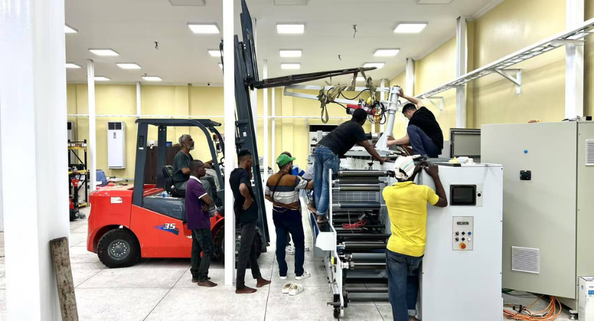 The team at Mangoe Labels & Flexible Packaging prepares its Tanzania-based facility for the new Weigang press.